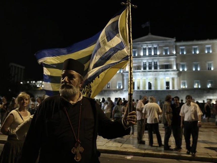 Grecia: Miles de personas marchan en apoyo al gobierno y contra la ...